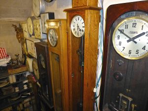 Master clocks line the wall to the basement