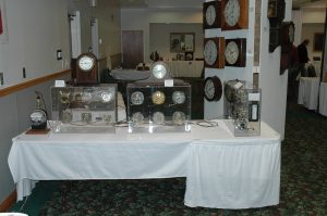 Sangamo Movement Display Cases made by Les McAlister to show the various Sangamo electrically wound movements in operation.