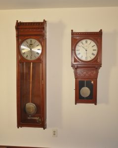Self Winding Clock Company regulator No.4 (left) and Self Winding Clock Company model #5. This is the same as an E Howard #75 case.