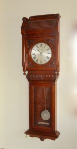 Self Winding Clock Company regulator #15. Extra fine movement, E. Howard type disc pendulum, 12 inch dial. Height 73 inches.